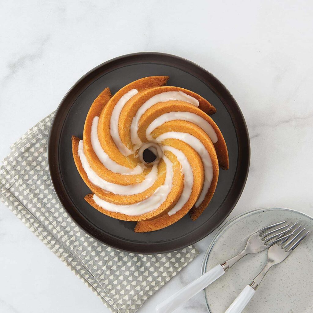 Golden Plated Bundt Cake Mould in Aluminum with Elegant Design and Resin Epoxy Mold Perfect for Kitchenware and Bakery Use